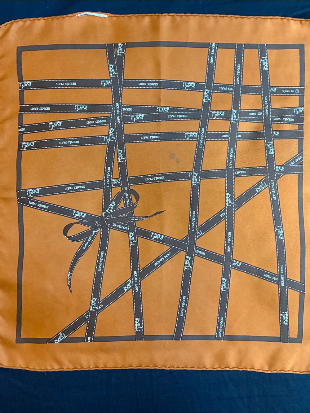 Hermes Orange Silk Scarf with Brown Ribbon Motif